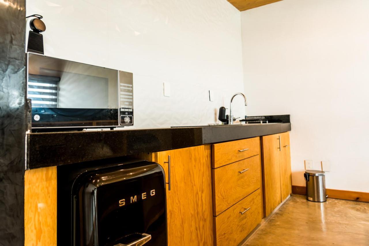 Casa Ticul Hotel Boutique - 5Th Ave (Adults Only) Playa del Carmen Exterior foto A kitchen with a refrigerator, stove, and oven